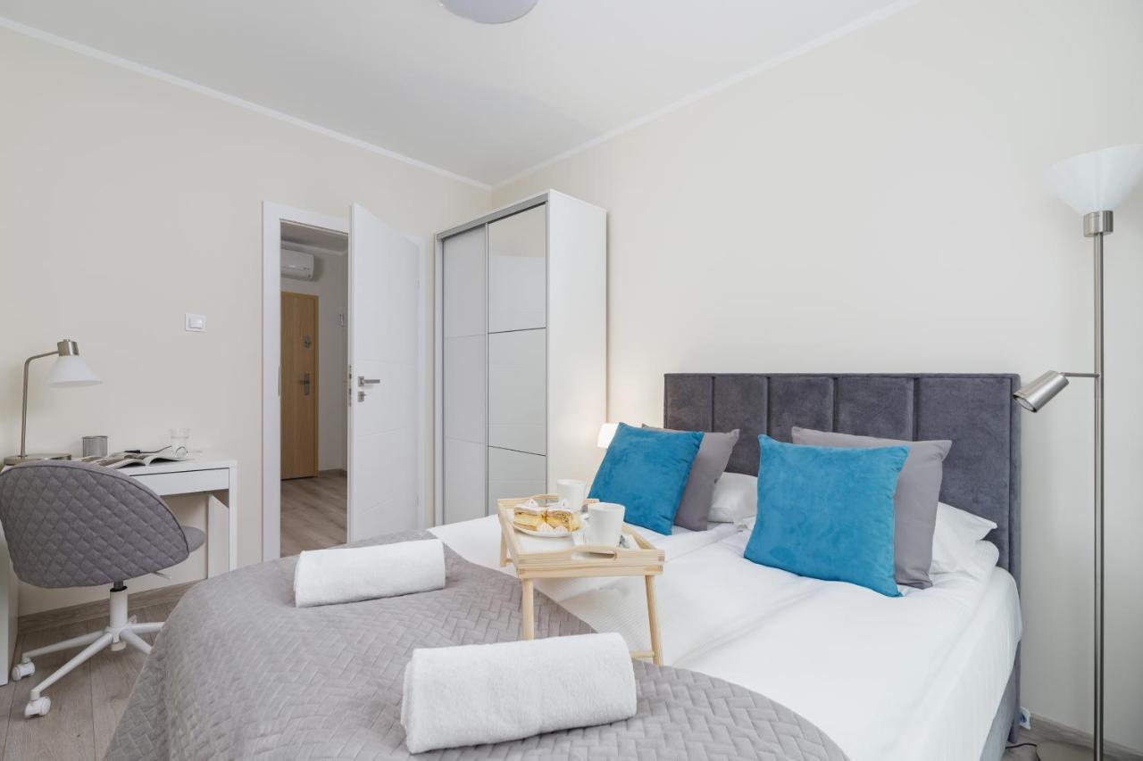 W Parku Lotnikow Apartments Tauron Arena By Noclegi Renters Krakau Buitenkant foto